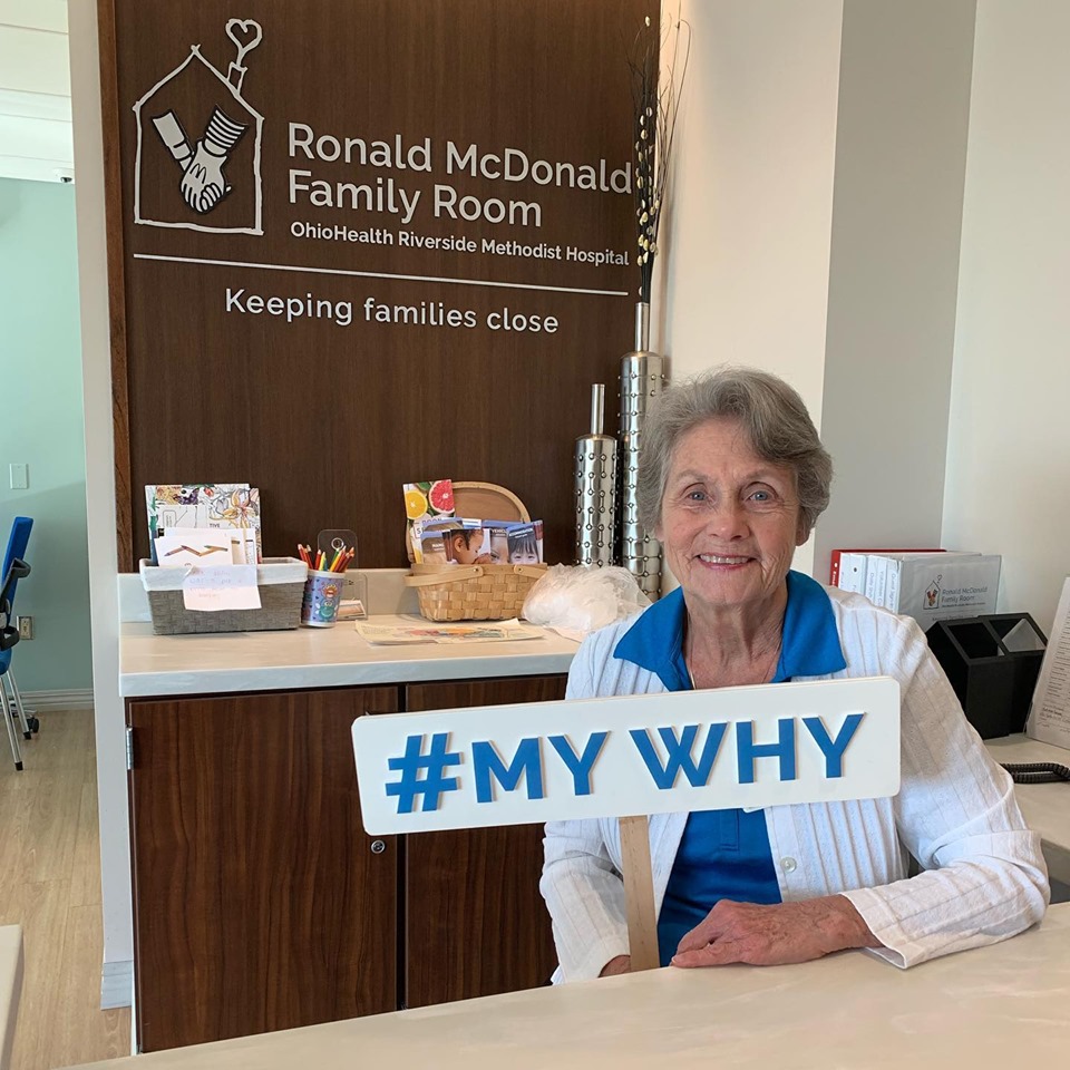 Judy Skinner sits behind the desk in the Ronald McDonald Family Room.