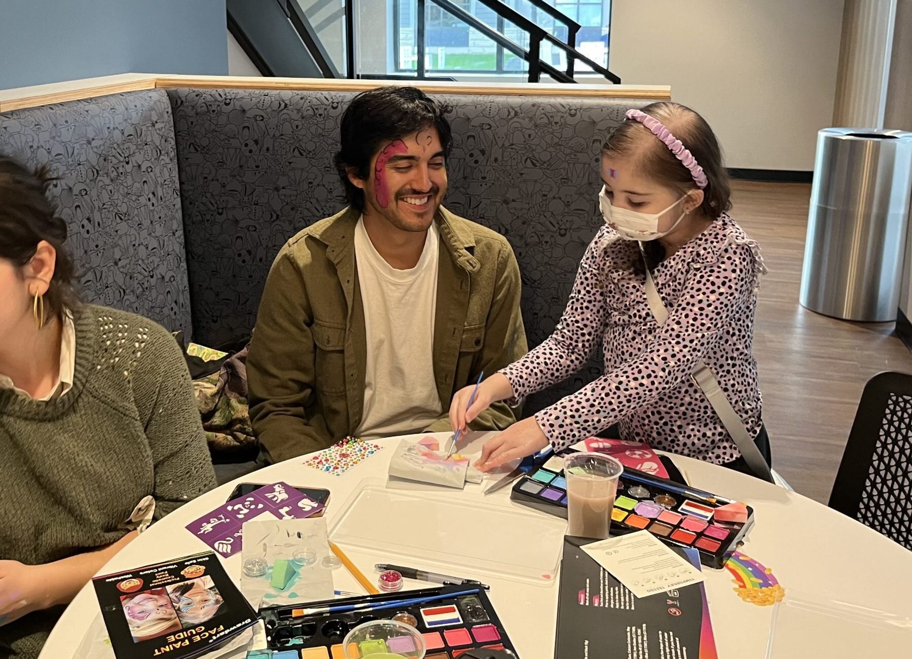 Girl participating in craft activity at RMHC of Central Ohio