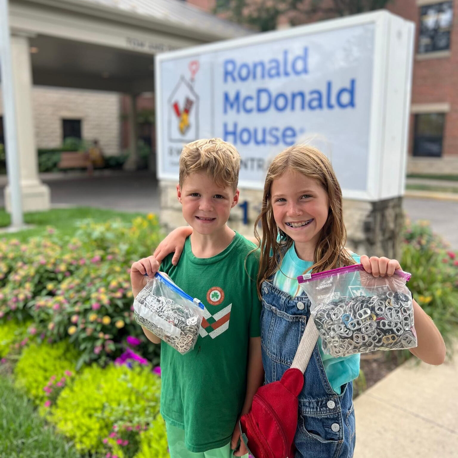 Children with pop tab collection for the pop tab battle, One of RMHC of Central Ohio's events