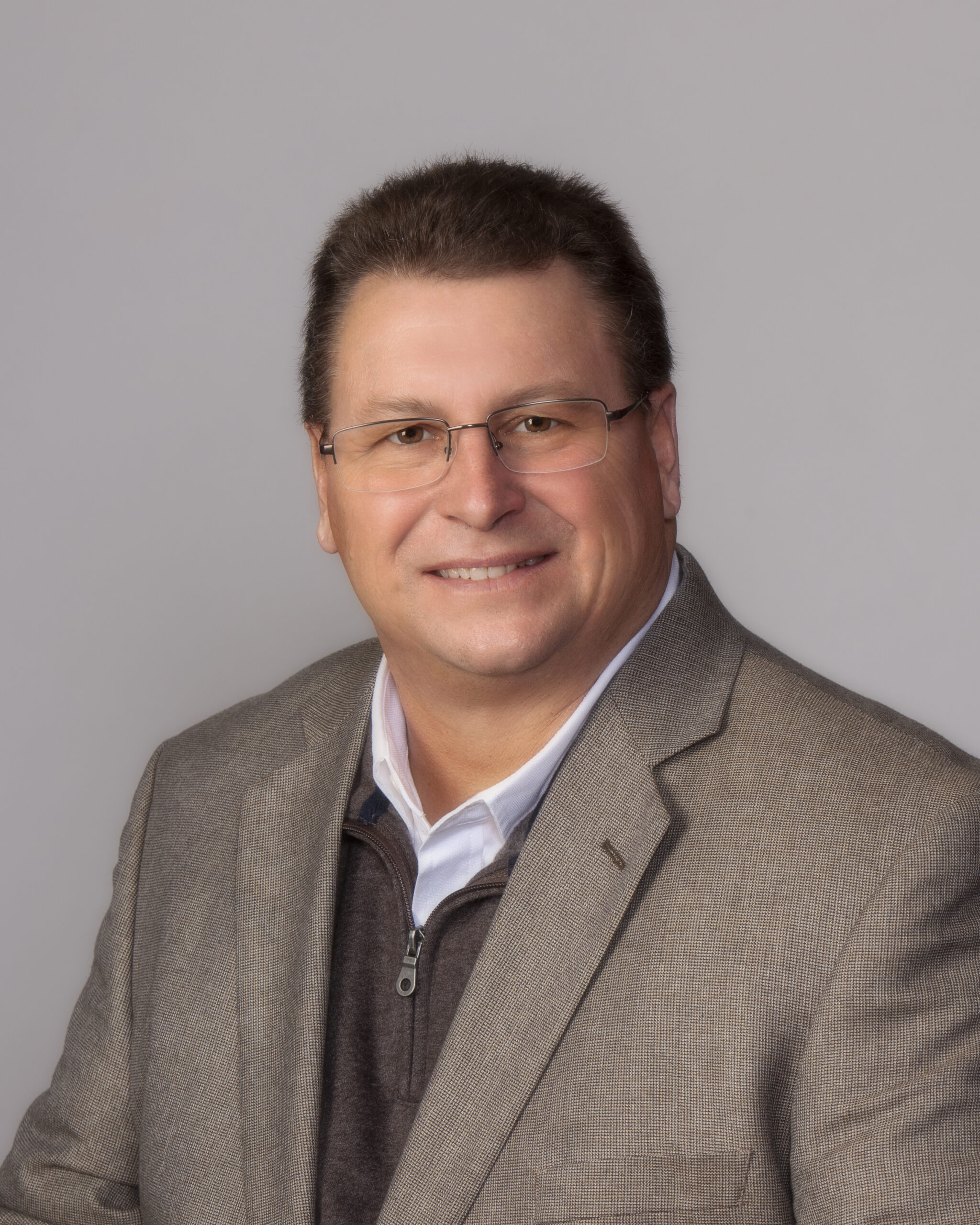 Headshot of Steve Sylvester in a suit