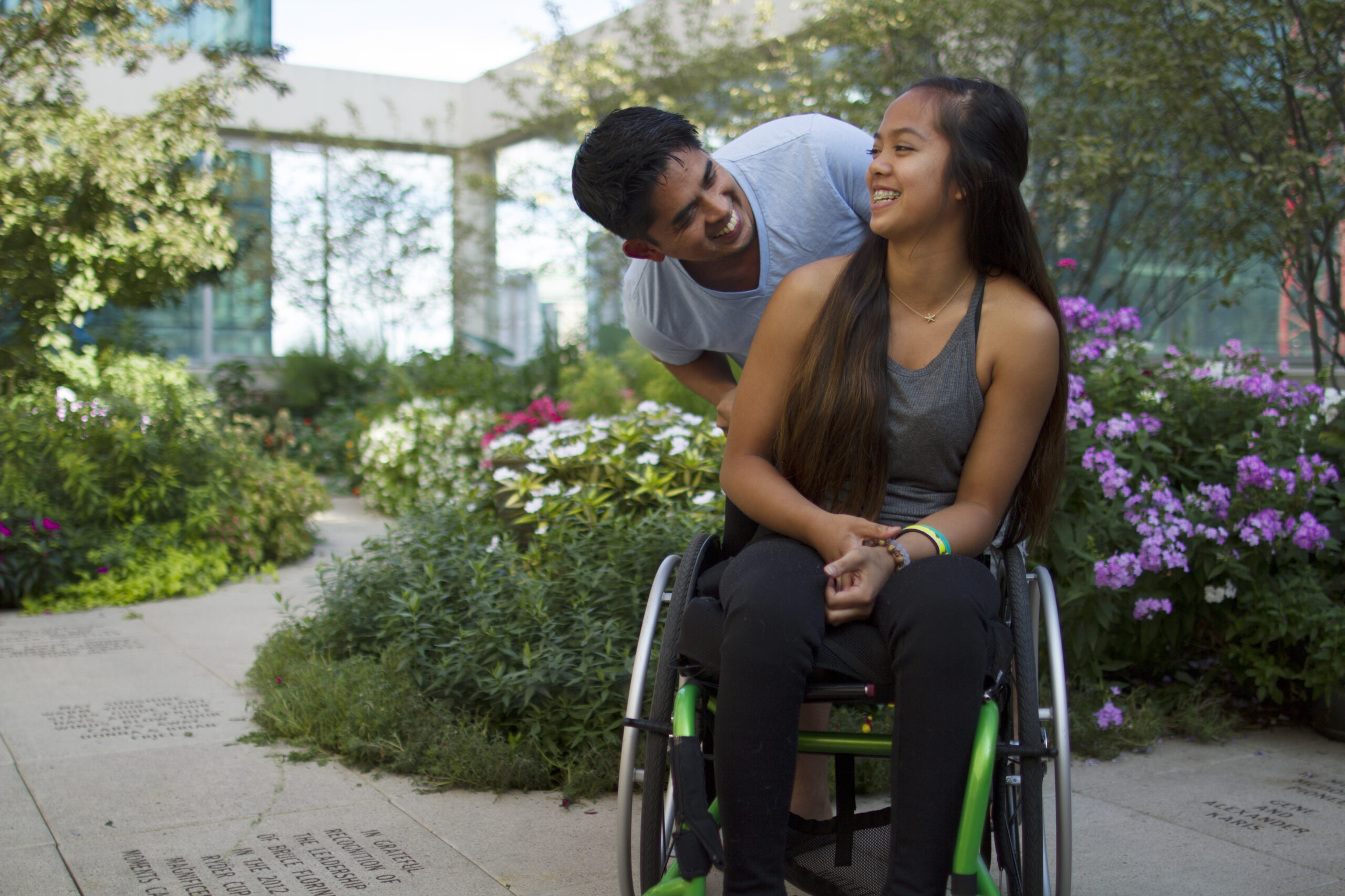 Boy and girl outside with flowers